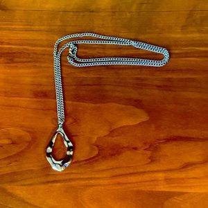 Silver accent chain.